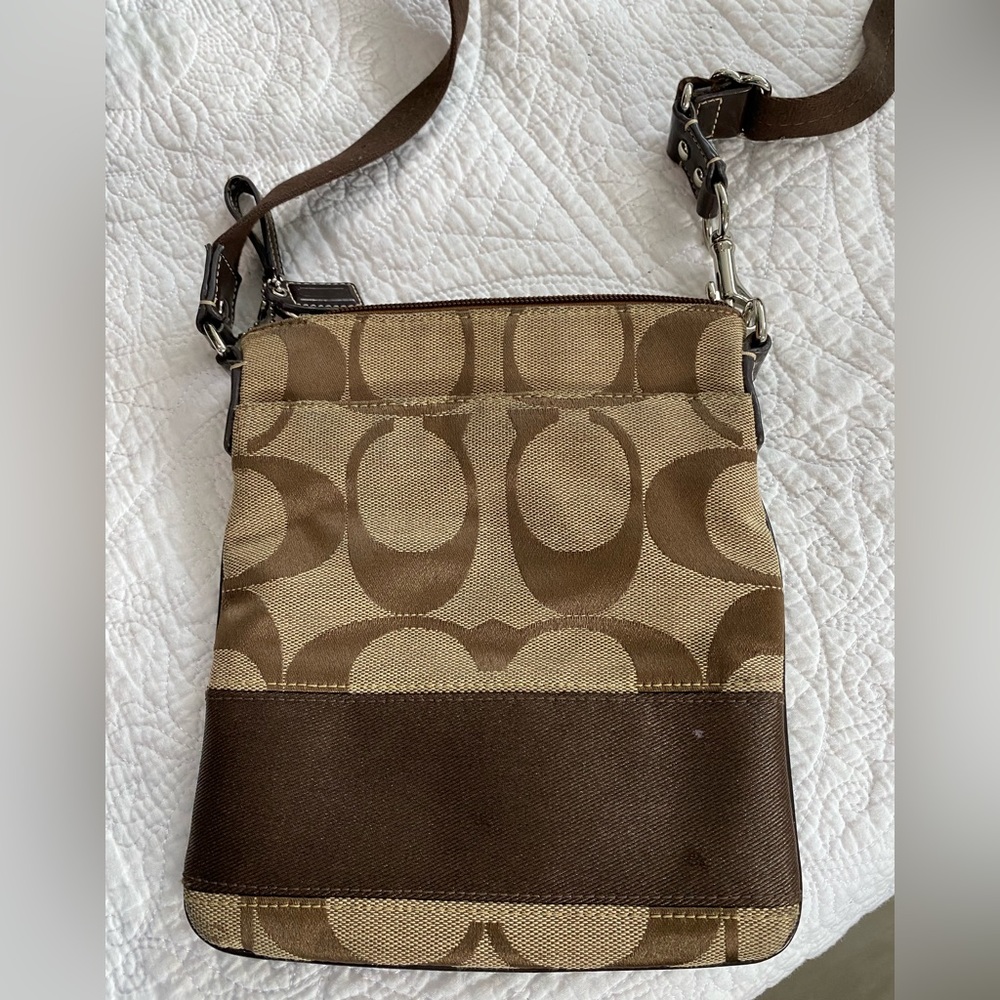 Coach bag In Signature Canvas. Brown. Good fair condition